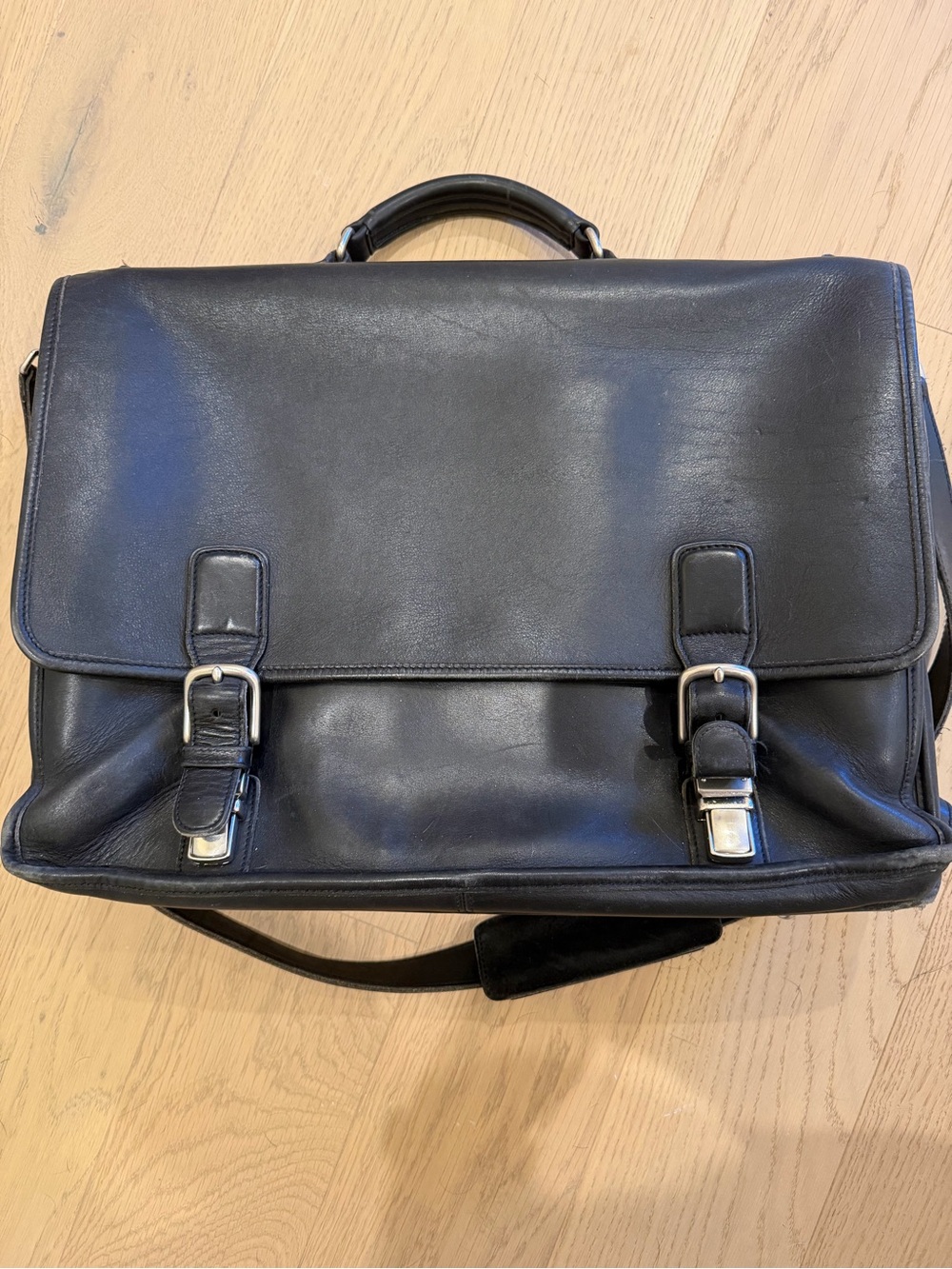 Coach Black Leather Messenger Bag with Buckle Accents